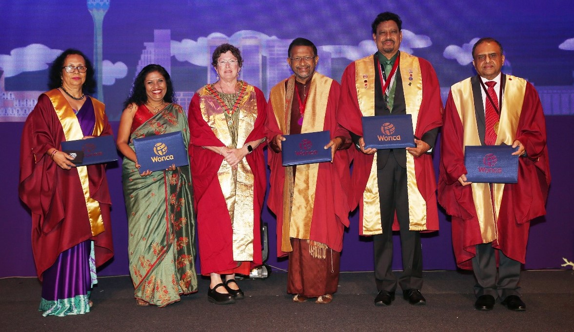 (from l to r) Drs Pushpa, Shyamalee, WONCA president, Drs Preethi, Sri Ranjan and Mathew with their WONCA certificates.